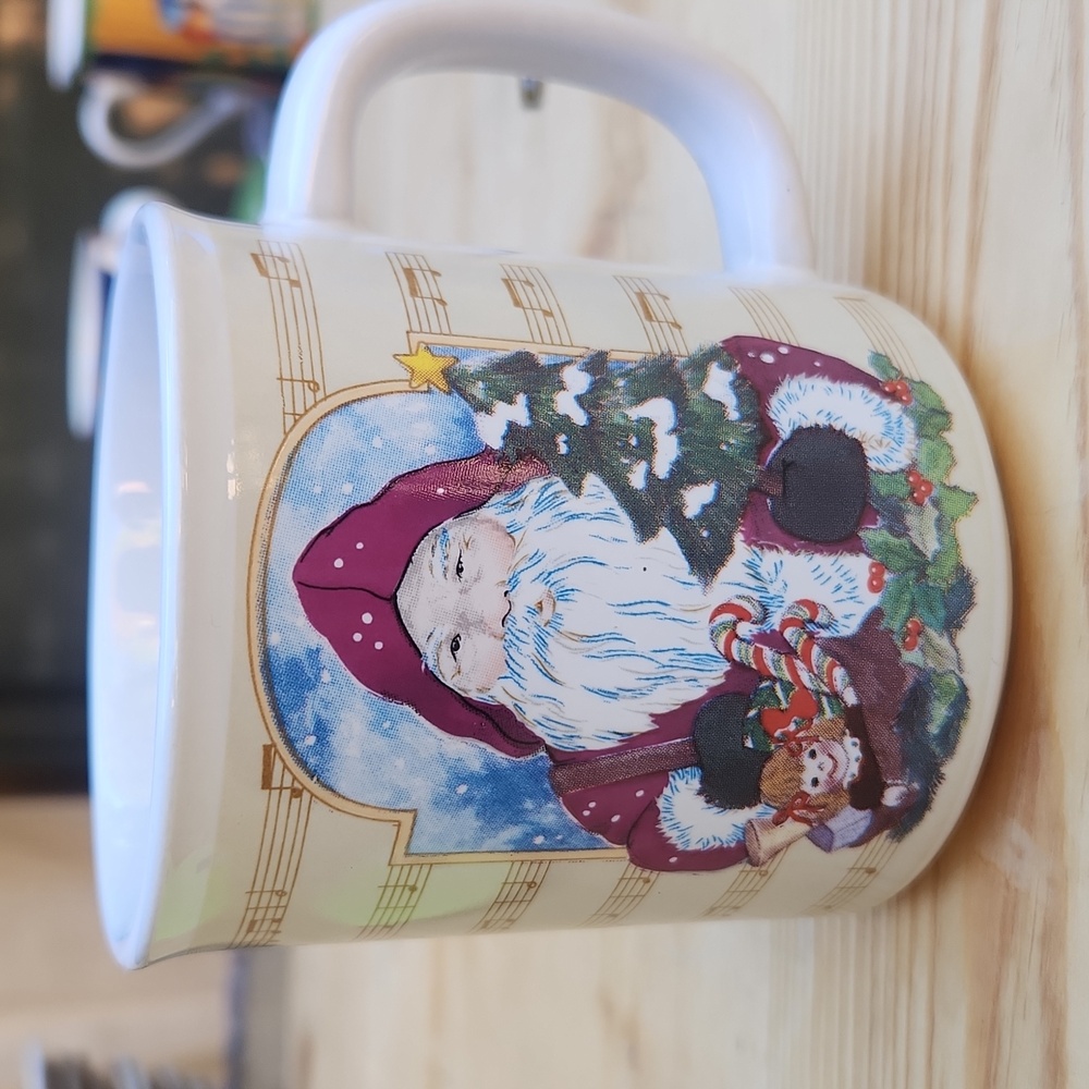 Santa Claus is coming to town Mug. Christmas musical notes